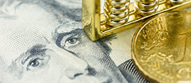 Face of Andrew Jackson on money surrounded by gold coins.