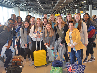 Group photo of people in airport